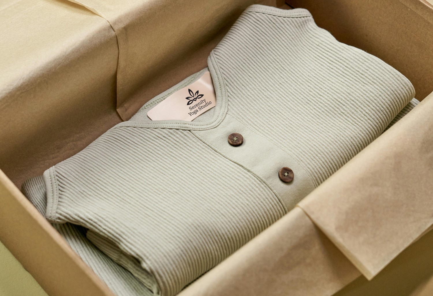 Sweater featuring tag with custom printed logo