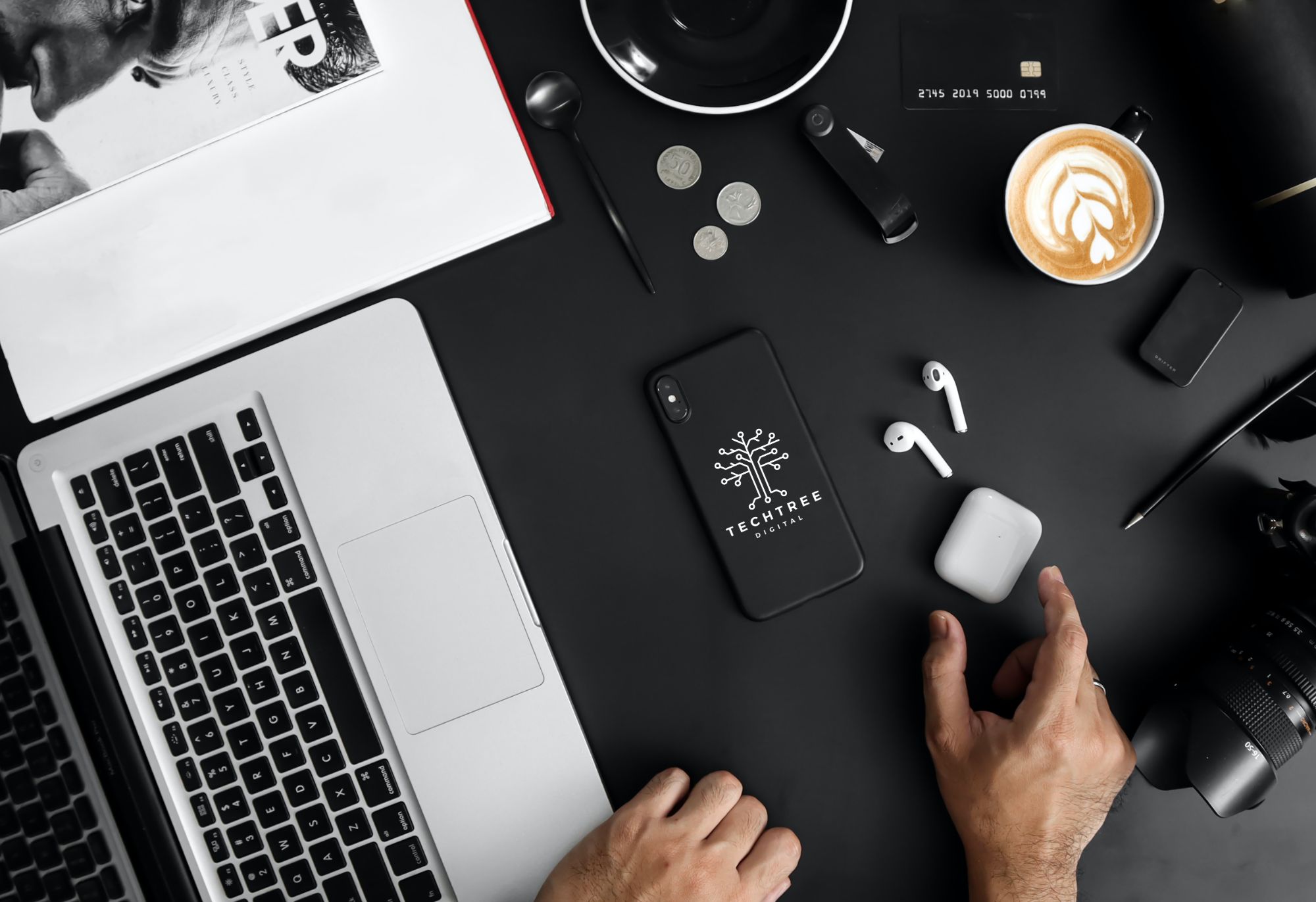 custom printed phone case sitting on a table with various other items